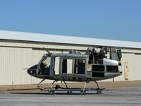 UNKNOWN @ GPM - Bell 205 type headed for a rebuild....I hope - by Zane Adams