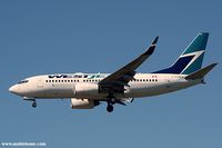 C-FUWS @ CYVR - Westjet flight landing at Vancouver - by Michel Teiten ( www.mablehome.com )