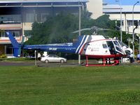VH-SGK @ YBCS - Ambulance Helicopter adjacent to Hospital on Cairns Promenade - by Terry Fletcher