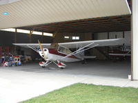 N3058E @ KLVN - Parked inside the hangar. - by Mitch Sando