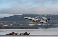 TF-FIA @ YXY - Leaving Whitehorse on an around-the-world charter flight. - by Murray Lundberg