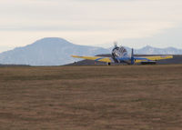 N12KY @ KAPA - The Spirit of '44 takes off with Pike's peak in the distance. - by Bluedharma
