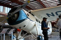 N105W @ FA08 - Lockheed Vega with owner Kermit Weeks - by Florida Metal