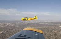 N48JC @ KAPA - Great picture of Jack, Downtown Denver and wing of Mustang - by John Little