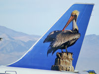 N948FR @ KLAS - Frontier Airlines - 'Pelican' / 2006 Airbus A319-111 - by Brad Campbell