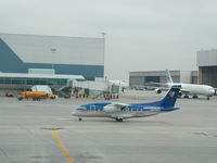 N355SK @ CYYZ - Midwest Dornier 328 taxiing at Toronto Pearson Airport - by Ken Wang