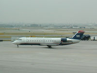 N446AW @ CYYZ - US Airways Bombardier CL-600 leaving Toronto Pearson Airport - by Ken Wang