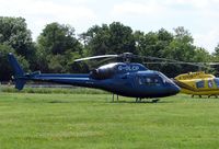 G-OLCP - Helicopters arrive at the temporary Heliport on 2007 Epsom Derby Day (Horse racing)