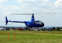 G-SJDI - Helicopters arrive at the temporary Heliport on 2007 Epsom Derby Day (Horse racing)