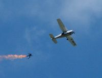G-SKYE - Parachutists jump from G-SKYE overhead Epsom Racecourse on 2007 Derby Day