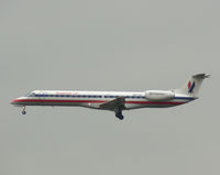 N671AE @ DFW - Rainy day at DFW - Landing 18R