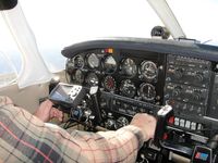 N54412 - Don at the controls somewhere over Missouri - by Bob Simmermon
