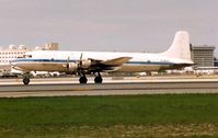 HI-592CT @ MIA - This DC6-B used to regularly operate for Aerochargo and Aeromar into Florida , but now lies derelict in the Dominican Republic . Interestingly originally registered as N6815C it worked as an Airborne TV Station , before being sold to LAN Chile