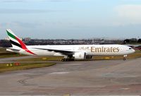 A6-EBX @ EGBB - Emirates B777-300ER c/n 32729 taxies in after its flight from Dubai - by Terry Fletcher