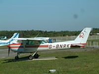 G-BNRK @ EGLK - Taken at Blackbushe Airport 8th September 2004 (sorry about the black spot on the lens) - by Steve Staunton