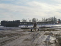 N13072 @ KLVN - Starting up infront of its hangar. - by Mitch Sando