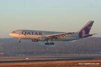 A7-AFB @ ELLX - Qatar cargo touching down late in the winter afternoon on runway 26 - by Michel Teiten ( www.mablehome.com )