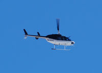 N38AZ - Flying over Columbine High School - by Bluedharma