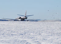 N284CP @ KAPA - Takeoff and full power. Look at the snow fly! - by Bluedharma