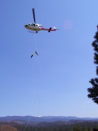 N213KA @ 72CA - double-rappeling at the Plumas Helitack base - by Matt Jurach