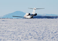 N987QS @ KAPA - Takeoff on 17L with Pikes Peak in the distance. - by Bluedharma