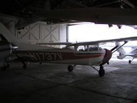 N1737V @ KSYN - Parked inside the main hangar at Stanton. - by Mitch Sando