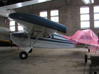 N2815P @ KSYN - Parked inside the main hangar at Stanton. - by Mitch Sando