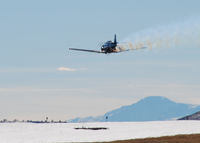 N7648E @ KAPC - Trophy Hunter does a Tower flyby with smoke. Pikes Peak in the distance. - by Bluedharma
