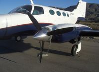C-FFAP @ SZP - 1967 Cessna 402, two Continental TSIO-520-VBs 325 Hp each, propeller security chain & lock - by Doug Robertson
