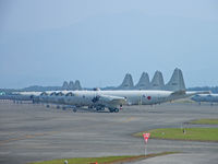 5027 @ RJFY - Lockheed P-3C/Kanoya AB (heads a line of P-3's on the ramp) - by Ian Woodcock