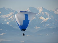 N9713T - Balloon near the Alps in Switzerland - by Keith Sproul