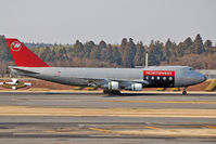 N640US @ NRT - Just touched down - thrust reversers deployed - by Micha Lueck