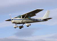 G-BGLG @ EGCF - Cessna 152 landing on a very windy day at Sandtoft - by Terry Fletcher