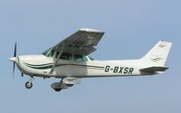 G-BXSR @ EGSF - Cessna 172 about to land at Conington - by Simon Palmer