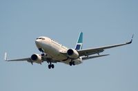 C-FWSX @ CYVR - Westjet landing at Vancouver - by Michel Teiten ( www.mablehome.com )