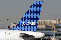 N643JB @ KLAS - jetBlue Airways - 'Blue Jersey' / 2006 Airbus A320-232