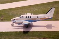 N769 @ DPA - Photo taken for aircraft recognition training.  Beech King Air 90 taxiing by the control tower - by Glenn E. Chatfield