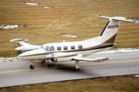 N401TW @ DPA - Photo taken for aircraft recognition training. Cheyenne 400LS taxiing by the control tower - by Glenn E. Chatfield