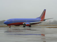 N614SW @ DAL - Southwest Airlines - In the rain at Love Field, Dallas, TX - by Zane Adams