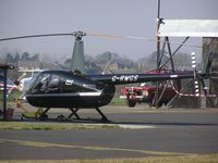 G-RWGS @ EGSF - Robinson R44 Raven II at Conington - by Simon Palmer