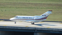 N817QS @ TPA - Netjets Hawker 800XP taxies to the Executive ramp at Tampa