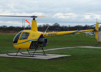 G-NWDC @ EGCB - Robinson R22 at Manchester Barton in Feb 2008