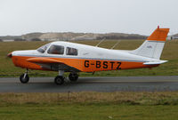 G-BSTZ @ EGNH - This Piper wear the Tangerine and White Colours of the local Soccer Team - by Terry Fletcher