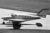 N38LP @ DPA - Photo taken for aircraft recognition training.  Taxiing by the control tower. - by Glenn E. Chatfield