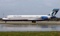N954AT @ FLL - Air Tran awaits departure from a very wet FLL - by Terry Fletcher