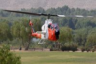 N109Z - US Forest Service Bell 209 N109Z landing at Hansen Dam Park. - by Dean Heald