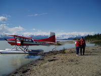 N70391 - Owner and wife on Beluga Lake, Alaska (Alaska Range) - by Dan Pavey