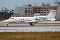 N296L @ MIA - Learjet 60 taxies in after landing at Miami in Feb 2008 - by Terry Fletcher