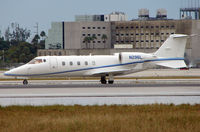 N296L @ MIA - Learjet 60 taxies in after landing at Miami in Feb 2008