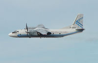 UK-26003 @ MIA - Although Ukraine registered this AN26 has been based in Florida for some time now - seen climbing out of Miami in Feb 2008